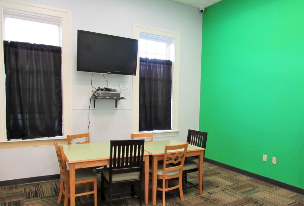 Lincoln County Public Library room with green screen wall and xbox